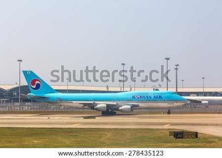HONG KONG - APR 30, 2015: Korean Air flight in Hong Kong International Airport. About 90 airlines operate flights from HKIA to over 150 cities across the globe.