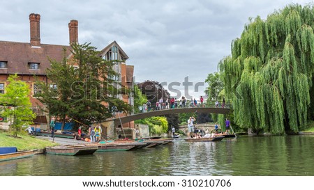 CAMBRIDGE, UK - JULY 24, 2015: Trinity College Punts. Trinity College is the largest constituent college of the University of Cambridge in England.