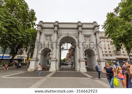 LONDON, UK - JULY 22, 2015: Marble Arch is a 19th-century white marble faced triumphal arch and London landmark. The structure was designed by John Nash in 1827.