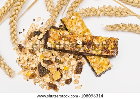 Protein bars with dried fruit on white background (not isolated)