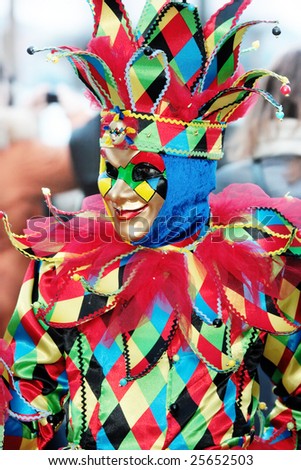 Portrait of multicolored venetian mask of smiling joker