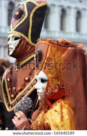 Elegant masks at Venice carnival