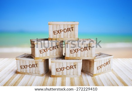 Wooden crate on wood floor and have a background of the sea.