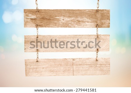 Wood sign board for text and design on colorful blurred background ,Clipping path