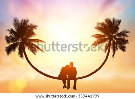Abstract from silhouette of love couple sit on  coconut tree on sunset sky