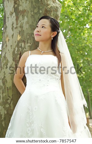 Asian bride in wedding dress