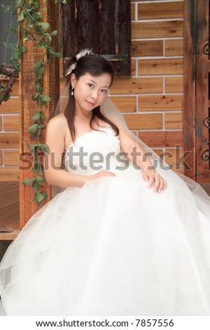 http://image.shutterstock.com/display_pic_with_logo/109891/109891,1197779404,1/stock-photo-asian-bride-in-wedding-dress-7857556.jpg