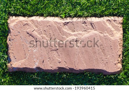 slabs on the grass , artificial turf and slab
