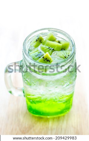 Kiwi soda in a glass , top view kiwi with soda , Kiwi fruit juice