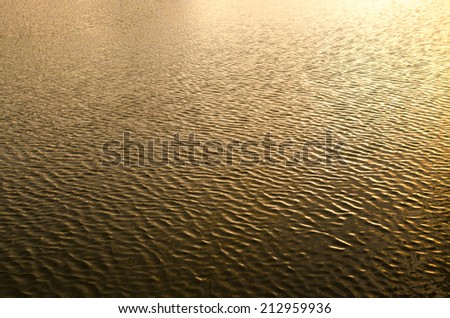 Water surface in the light of the setting sun top view for background  , Sunset over Water