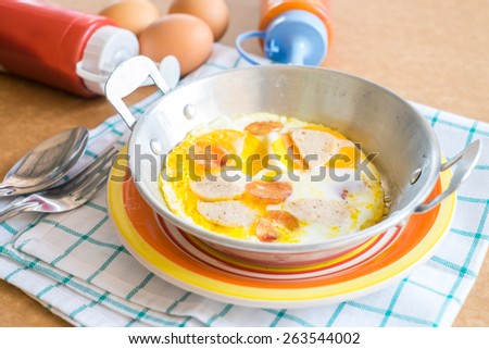 Egg in copper pan for breakfast  , Egg on pan for breakfast , Tablecloth ,still life breakfast
