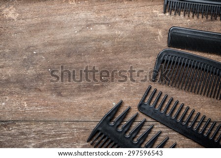 wooden background with Professional set combs