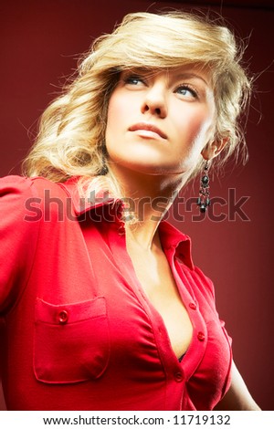 sexy girl in red blouse on background