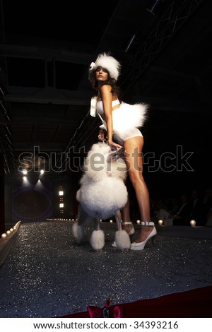 WARSAW, POLAND - AUGUST 27:  A model walks the runway at the New Face Agency  Fashion Show on August 27, 2007 in Warsaw Poland