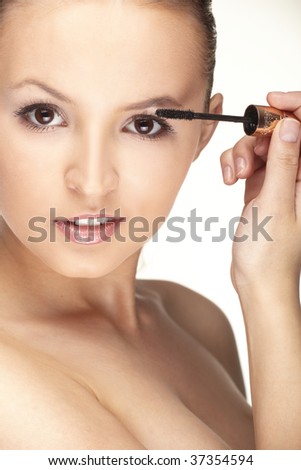 Portrait of Beautiful brunette woman doing daily morning routines