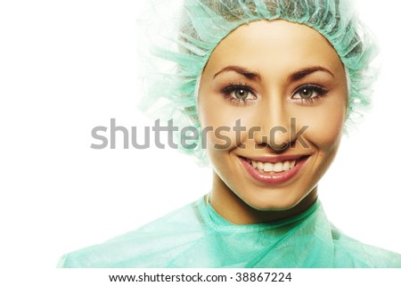 A friendly surgical nurse in scrubs and a hairnet