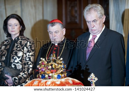 PRAGUE - MAY 9: Czech crown jewels and Czech notabilities during opening ceremony of exhibition in Prague castle, Czech republic, May 9, 2013