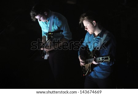 PRAGUE - FEBRUARY 26: Sam Halliday (left) and Alex Trimble (right) of Two Door Cinema Club during performance in Prague, February 26, 2013