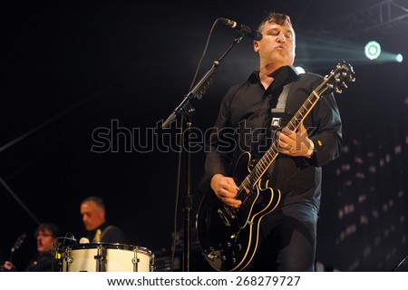 HRADEC KRALOVE - JULY 4: Singer and guitarist Greg Dulli of famous American band The Afghan Whigs during performance at festival Rock for People in Hradec Kralove, Czech republic, July 4, 2014.