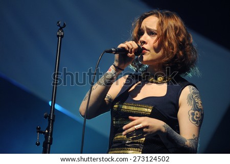 HRADEC KRALOVE - JULY 5: Singer Amina of Kadebostany band during performance at festival Rock for People in Hradec Kralove, Czech republic, July 5, 2014.