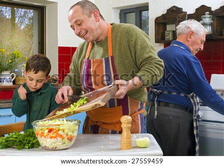 father child and grandfather cooking in the kitchen together