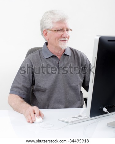 senior man with  computer at home
