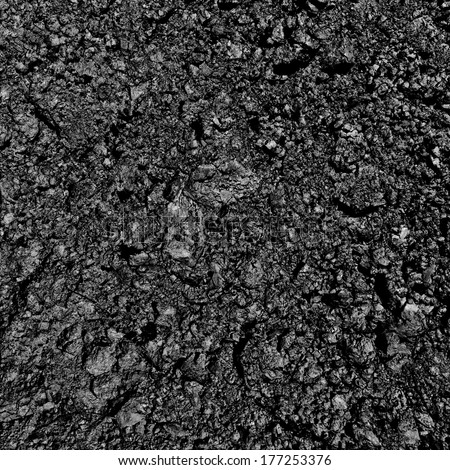 Black rock textured ground.