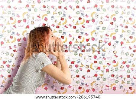 Young girl shouting over cute background