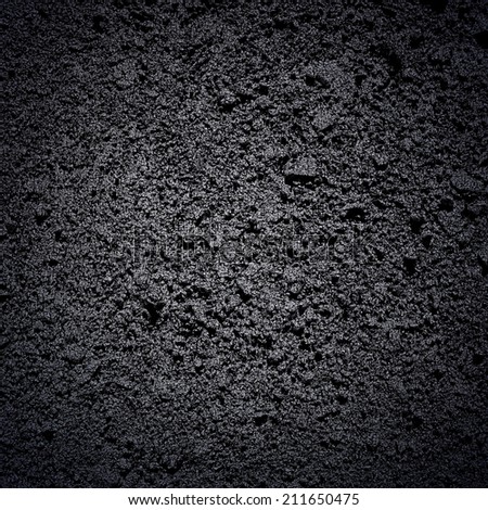 Black rough textured wall. Background.