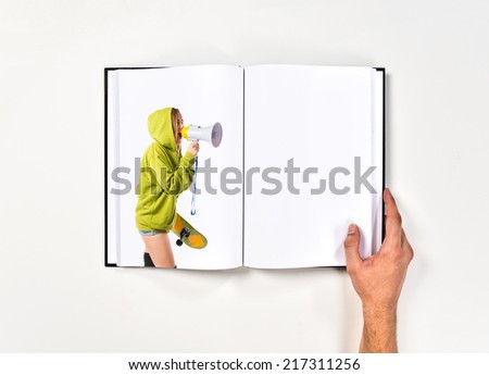 Young girl shouting printed on book