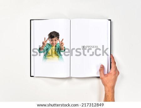 Lucky brunette kid printed on book