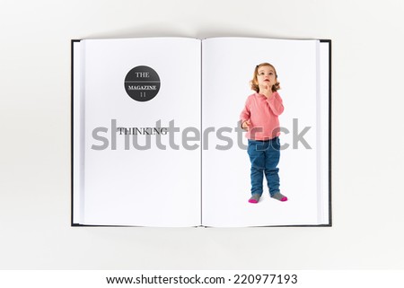 Little girl thinking printed on book