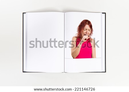 Young girl yawning printed on book