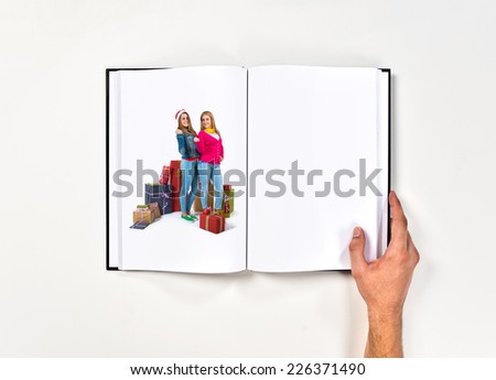 Christmas women doing victory gesture printed on book