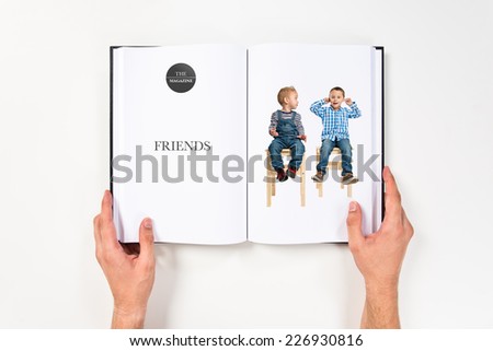 Boy making a mockery printed on book