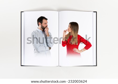 Couple seducing printed on book