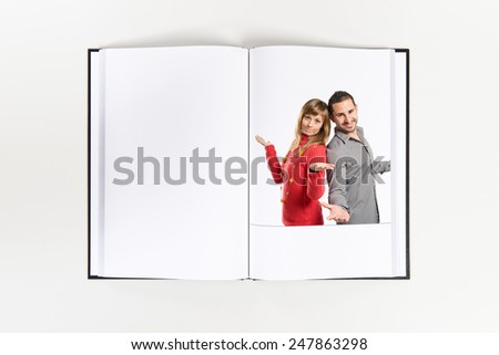 Couple printed on book