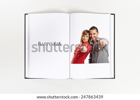 Couple pointing to the front  printed on book