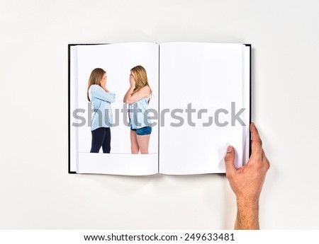 Friends covering her eyes printed on book