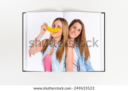 Friends playing with banana printed on book