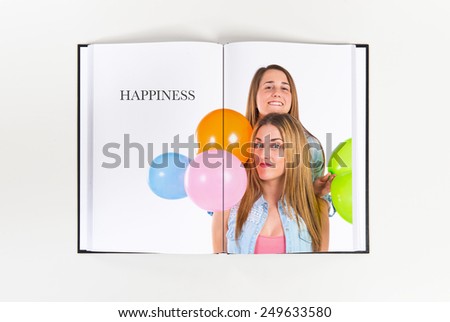 Friends with many balloons printed on book
