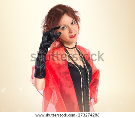 Woman in cabaret style doing tiny sign