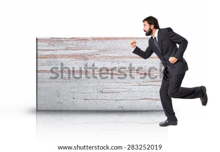 Businessman running fast on rectangular placard