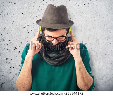Artist listening music over textured background
