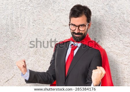Lucky businessman dressed like superhero