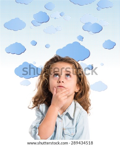 Blonde little girl thinking over clouds background