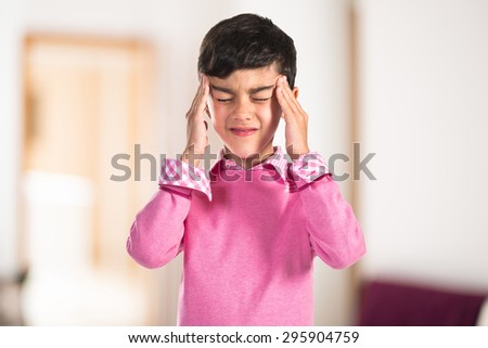 frustrated boy inside house