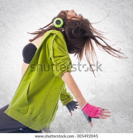 Teenager girl dancing street dance style