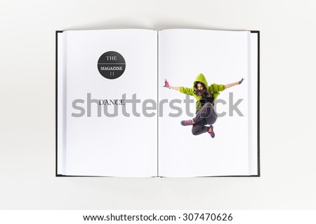 Teenager girl jumping in street dance style printed on book