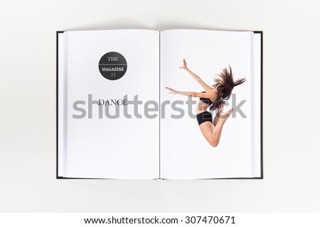 Young fitness female jumping printed on book